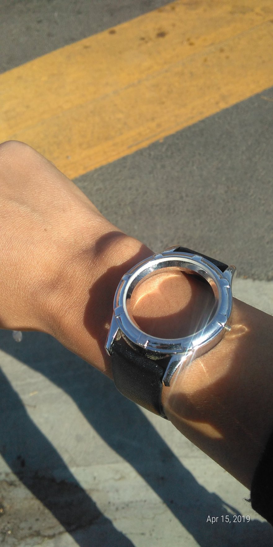 A faceless watch. Time never was when Man was not. 